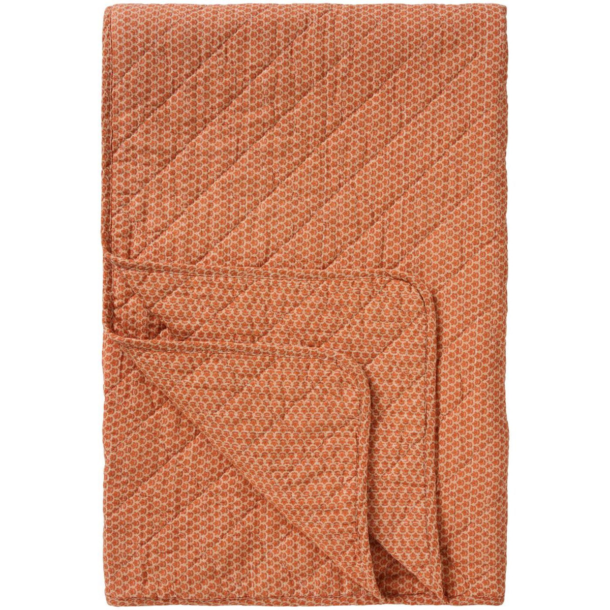 Orange quilt fra Ib Laursen med diskret quiltet blokmønster og blød vatteret overflade