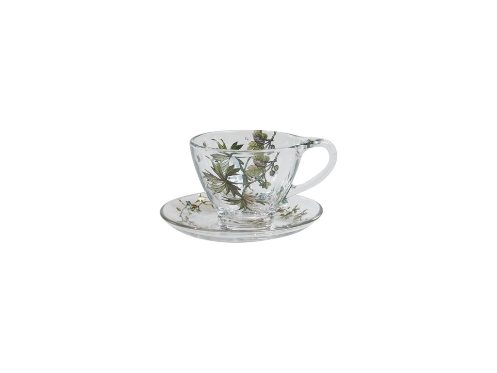 Glaskop med hank og matchende underkop fra Speedtsberg i klart glas med grønt blomstermotiv.