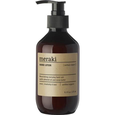 Meraki Northern Dawn økologisk håndlotion i brun pumpeflaske med 275 ml og frisk duft af appelsin, cedertræ og sød balsamico.