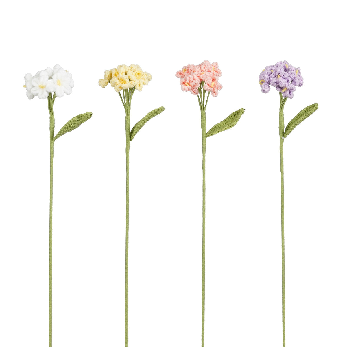Hæklede floks blomster i hvid, gul, lyserød og lilla med små blomsterklaser og grønne blade